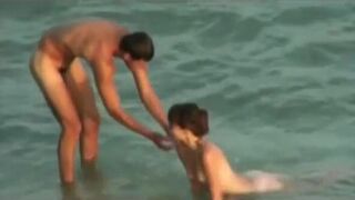 Naked Beach - Voyeur Captures Cute Little Tit Fuck and BJ - 2 image