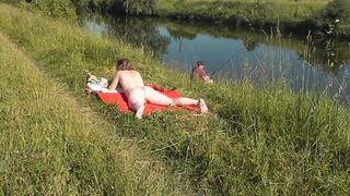 Wild beach. Hot mother I'd like to fuck Platinum bare sunbathing on river bank, random fisherman stud watches. Nude in public. Exposed beach - 15 image