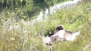 Konstanzia and Penis73 strip naked in public beach & play with their hairy pussies